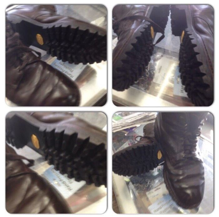 The same boots after repair, rebuilt with new lug soles and polished dark brown