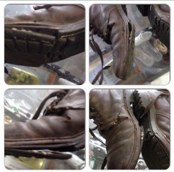 A customer's brown work boots before repair, with the soles worn through and coming apart