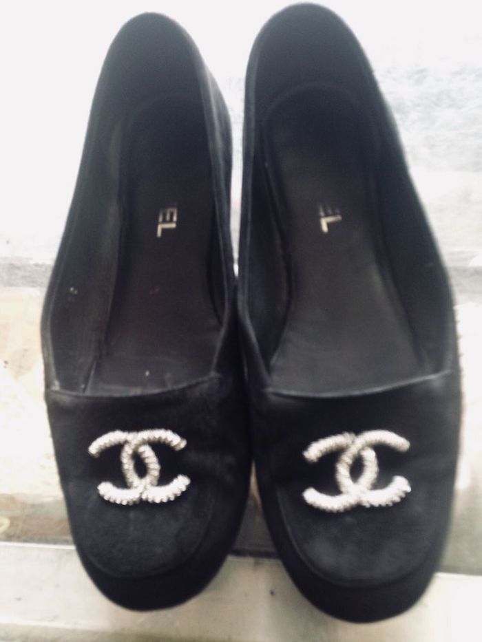 Black ballet flats after repair