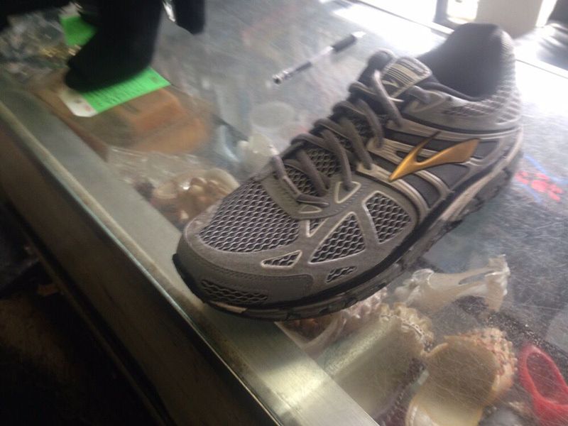 A running shoe after sole repair